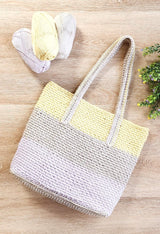 Back view of bag laid on wooden table. thumbnail