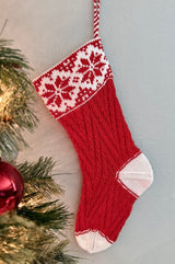 Heritage stocking with fair isle cuff in red and white. The heel and toe are white and the leg and foot are red with a textured stitch pattern. thumbnail