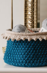 Teal basket with cream edging, holding 2 balls of yarn thumbnail