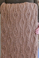 Close up of diamond texture on crochet blanket. thumbnail