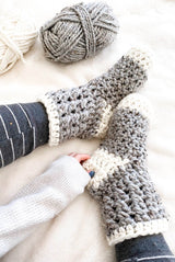 Close up on crochet socks with textured cuffs.  thumbnail