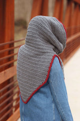 Back view of hooded crochet cowl, with hood up. Back extension has triangular point ending at waist.  thumbnail