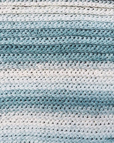 Extreme close-up of crochet wrap, showing ombre fade effect.  thumbnail