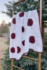 Closer view of crochet blanket in white and burgundy.  thumbnail