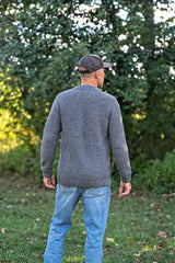 Back view of crochet cardigan, showing lower hem ribbing. thumbnail