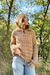 Front view of crochet sweater, with button placket and polo collar. thumbnail