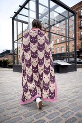 woman wrapped in cat face blanket  thumbnail