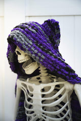 Knit Halloween theme blanket on a skeleton decoration thumbnail