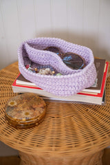 purple caddy with two compartments on a side table thumbnail
