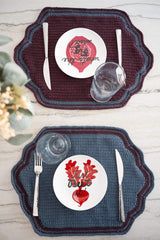 contrast color placemats on a table with cutlery and glasses on top  thumbnail